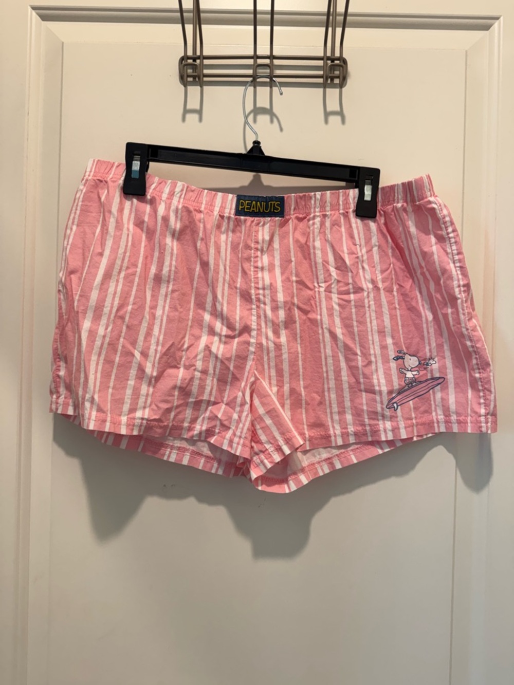 Peanuts brand striped boxer shorts featuring a graphic of Snoopy surfing Size XL